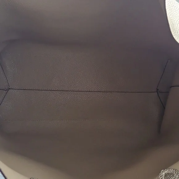 Michael Kors Shimmering  Gold Riversible Tote. - Picture 8 of 14